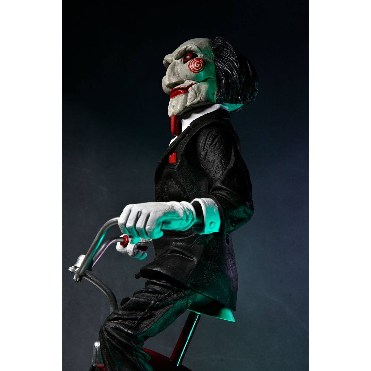 Saw action figure with sound Billy on tricycle 30 cm – Elbenwald